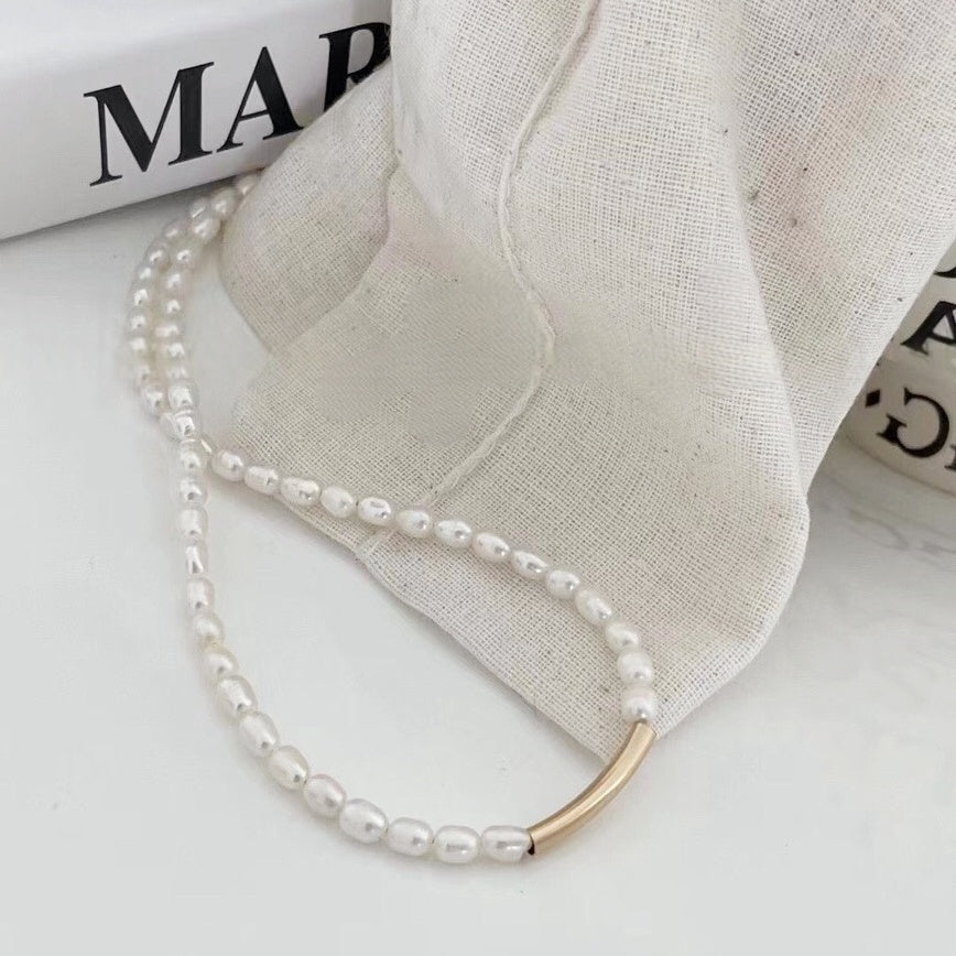 Golden Smile-Embellished Pearl Necklace