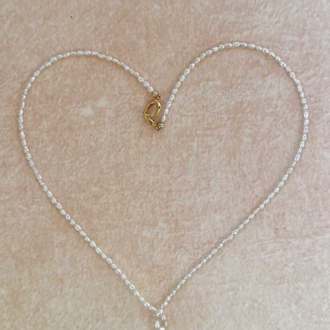 EIGHT-SHAPED GRADUATED PEARL NECKLACE