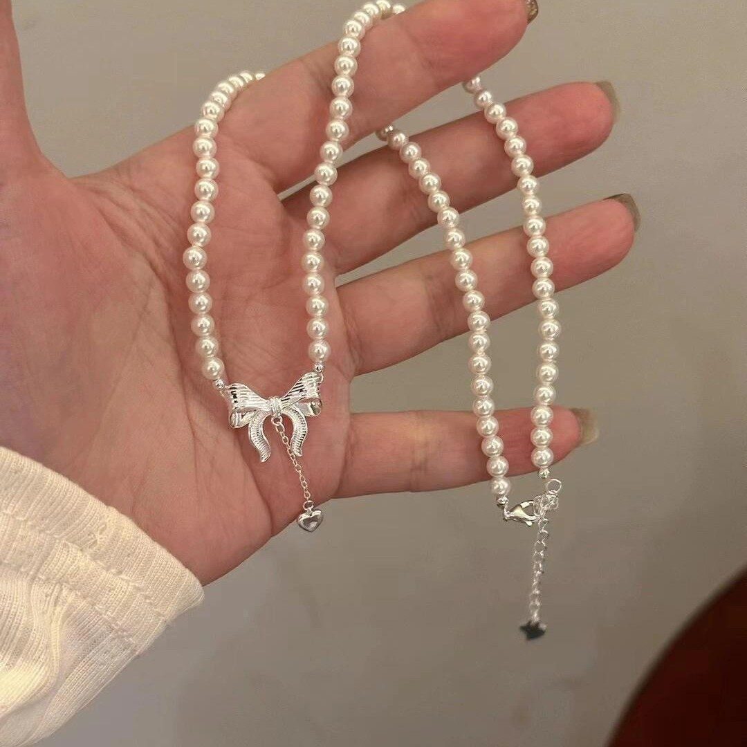 BOW PENDANT PEARL NECKLACE