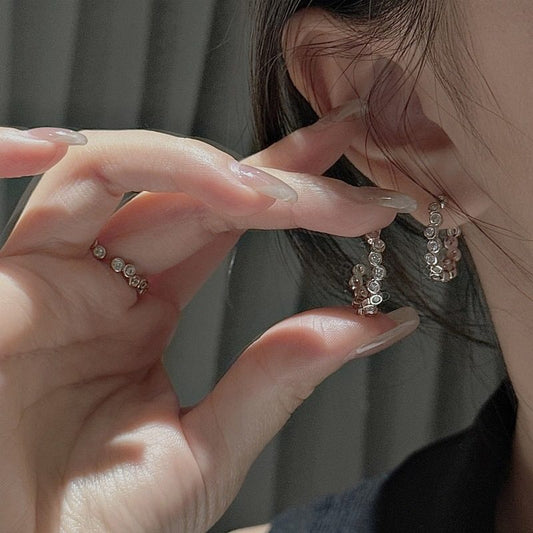 GEOMETRIC WAVE EARRINGS