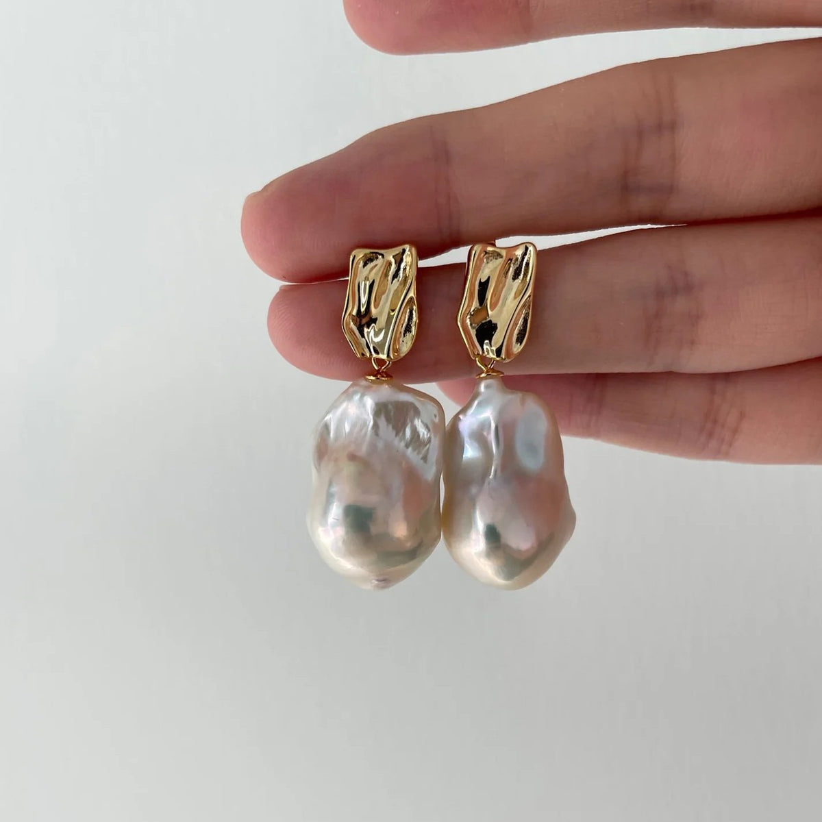 「 INTERPLAY 」EARRINGS