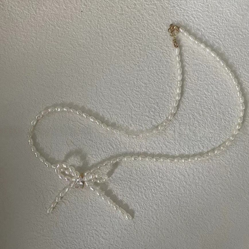 BOW GRADUATED PEARL NECKLACE