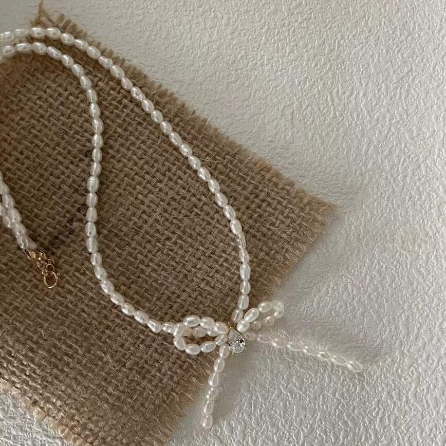 BOW GRADUATED PEARL NECKLACE