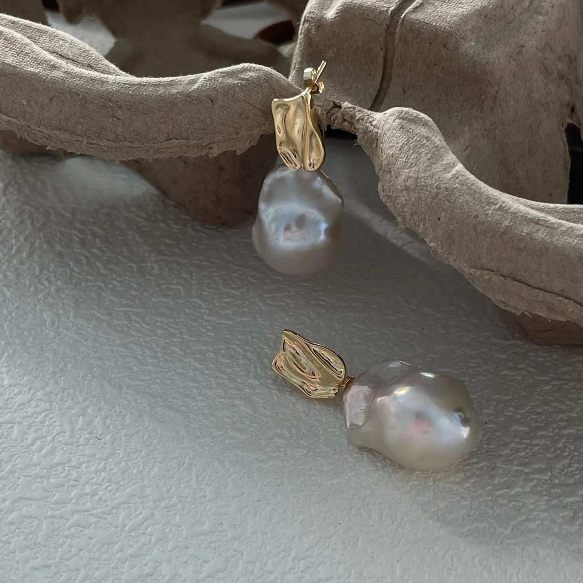 「 INTERPLAY 」EARRINGS