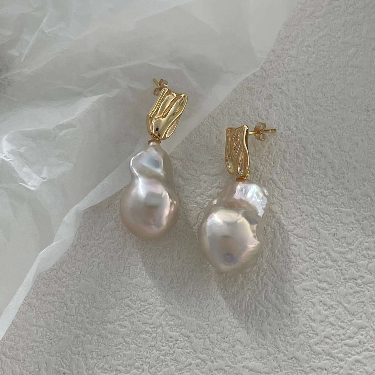 「 INTERPLAY 」EARRINGS