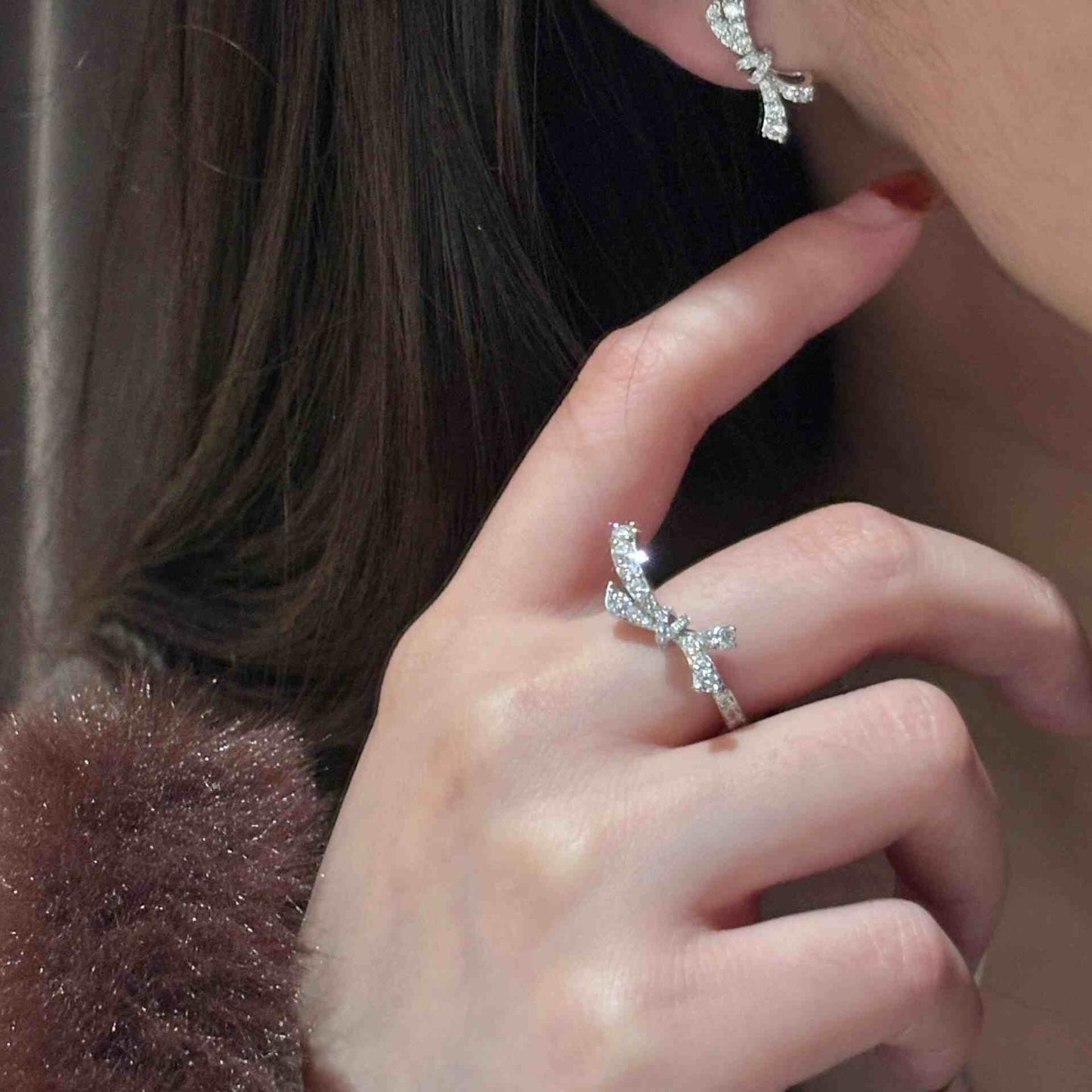 SCULPTED BOW ZIRCONIA RING