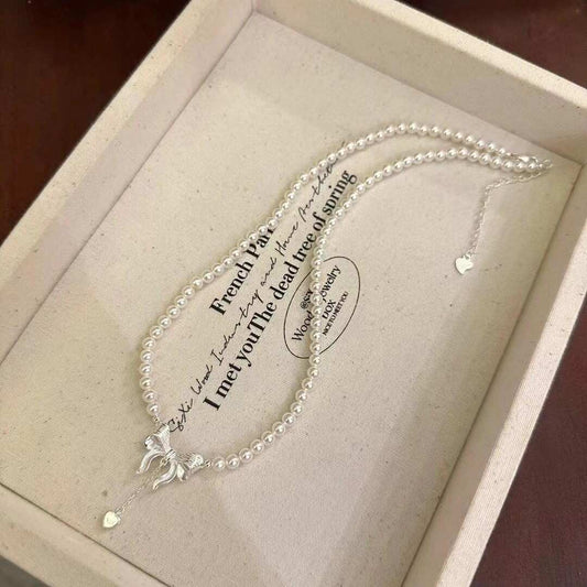 BOW PENDANT PEARL NECKLACE